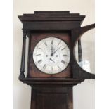 A George III oak long case clock by Smith of Sheffield, having 8-day movement and circular