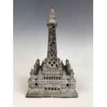 A late 19th / early 20th Century cast iron money box modelled as Blackpool Tower, 19 cm