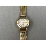 A 1960s lady's 18ct gold cased Rotary Incabloc manual-wind wristlet watch on a high-carat yellow-