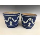 Two Wedgwood blue Jasperware cachepots, of graded stature, 18 and 17 cm respectively