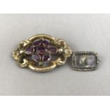 A Victorian pink paste and rolled gold brooch, the faceted stones rub-set and clustered to the