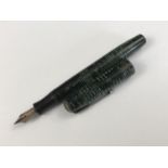 A 1930s Parker Vacumatic "Emerald Pearl" fountain pen, having an Art Deco "feathered arrow" clip