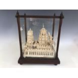 A late 19th Century balsa wood model of a South Asian temple, in glazed display case, 32 x 25 x 40