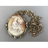 A Victorian carved shell cameo brooch, depicting a classical goddess and eagle, rub-set in a