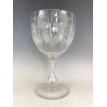 A giant Victorian free-blown glass goblet, the bowl of round-funnel form wheel-cut in a pattern of