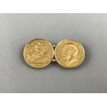 Two George V gold half Sovereigns, pellet-set and brooched