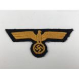 A German Third Reich Kriegsmarine tunic national emblem