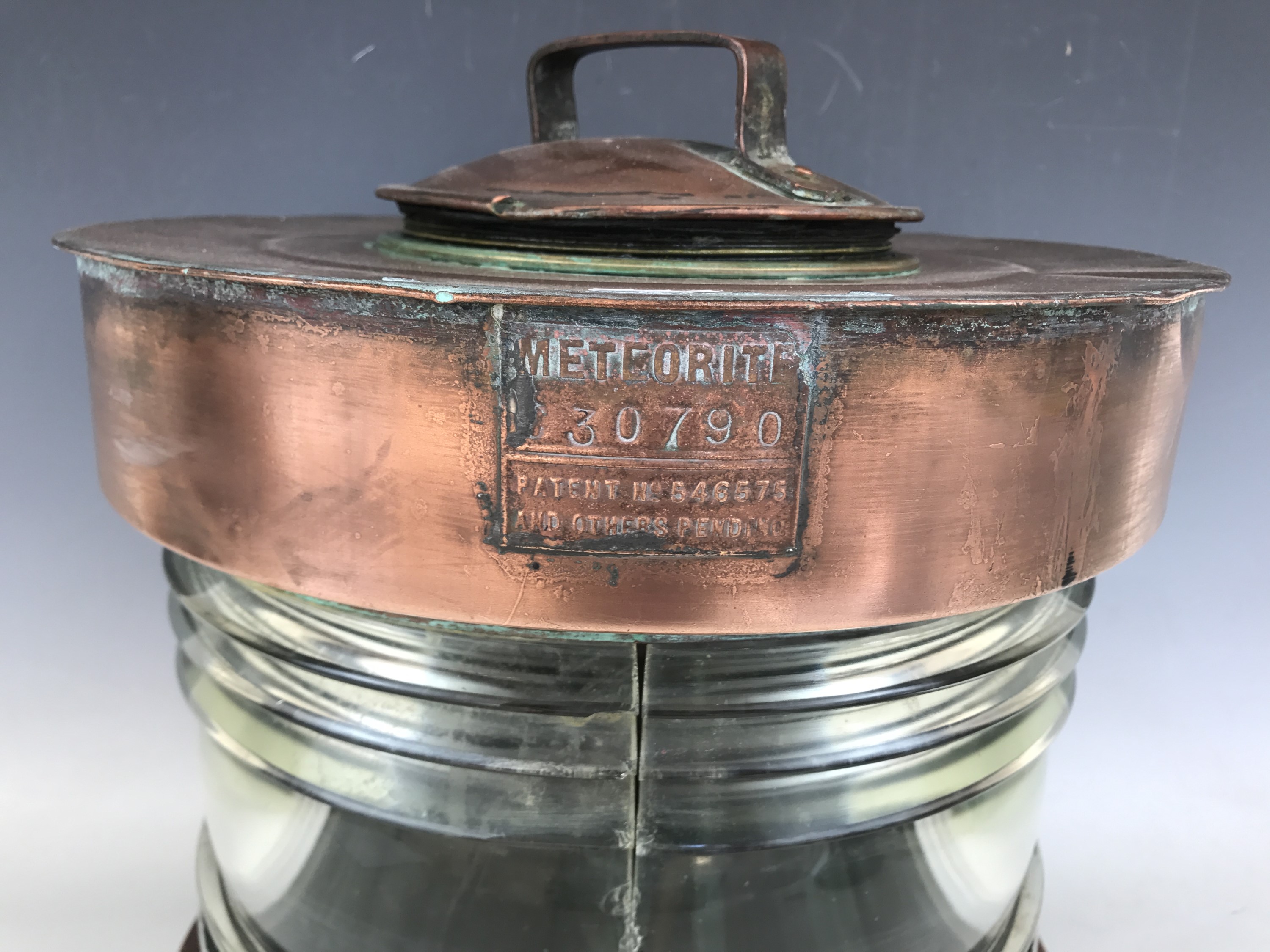 A ship's large copper Meteorite ship's masthead lantern, having a bisected clear fresnel lens, 35 - Image 2 of 2