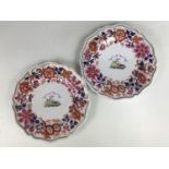 A pair of Flight Barr and Barr Worcester porcelain armorial plates, bearing the crest of the Dick
