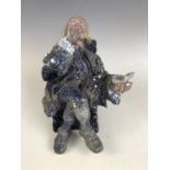 A Burgess & Leigh prototype figurine modelled as The Snuff Taker, bearing E T Bailey's name and date