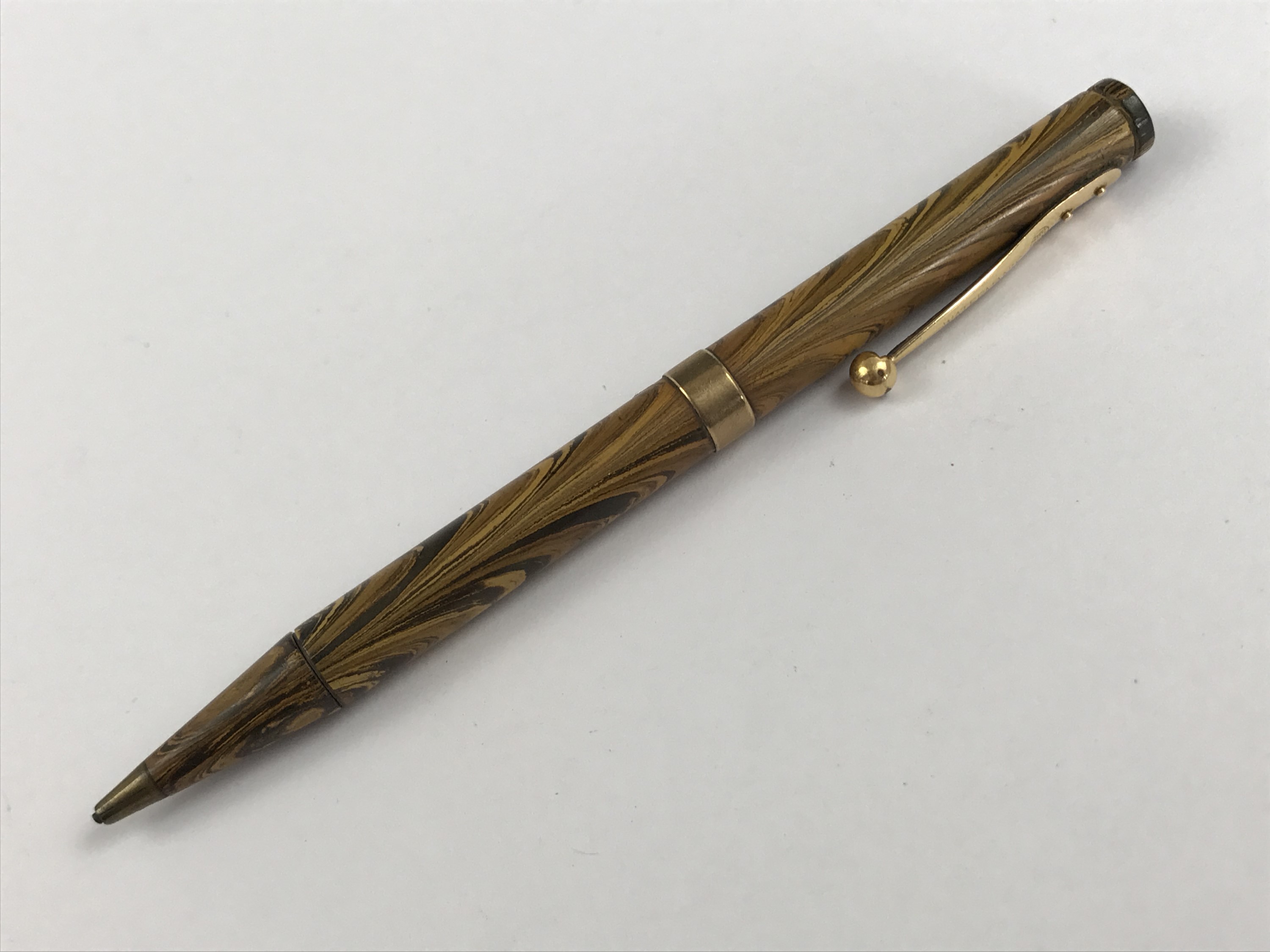 A 1920s 9ct gold mounted Waterman's Ideal "woodgrain" propelling pencil, London, 1928