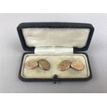 A set of Victorian 9ct gold cuff links, each having foliate-scroll-engraved oval faces, 4.1 g