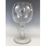 A giant Victorian free-blown glass goblet, the bowl of round-funnel form, over a hollow stem and
