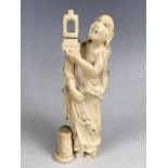 A Meiji Japanese carved ivory okimono depicting a monk, character marks to base, 13.5 cm