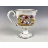 An early 19th Century English porcelain Christening cup, transfer-printed and hand tinted with a