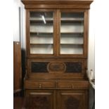 A Victorian oak bureau bookcase