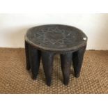 An Africa Nupe carved wooden stool, early 20th Century, circa 40 cm x 30 cm high