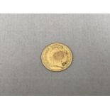 A George III 1801 gold one third Guinea