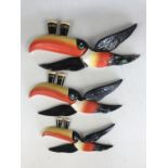 A set of three Carlton Ware Guinness toucan wall plaques, (these are period examples, the largest