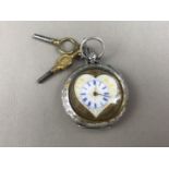 A late 19th Century lady's white metal fob watch with heart-shaped face