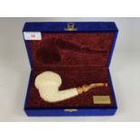 A large carved meerschaum pipe by Sevket of Turkey, cased