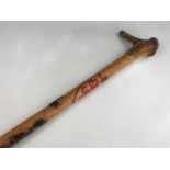 A Scottish antler-mounted carved wooden walking cane