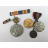 Four various Victorian and later Royal commemorative medallions and medal ribbon bars