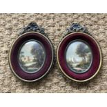 A pair of hand-painted miniatures depicting rural idylls, uniformly framed under glass