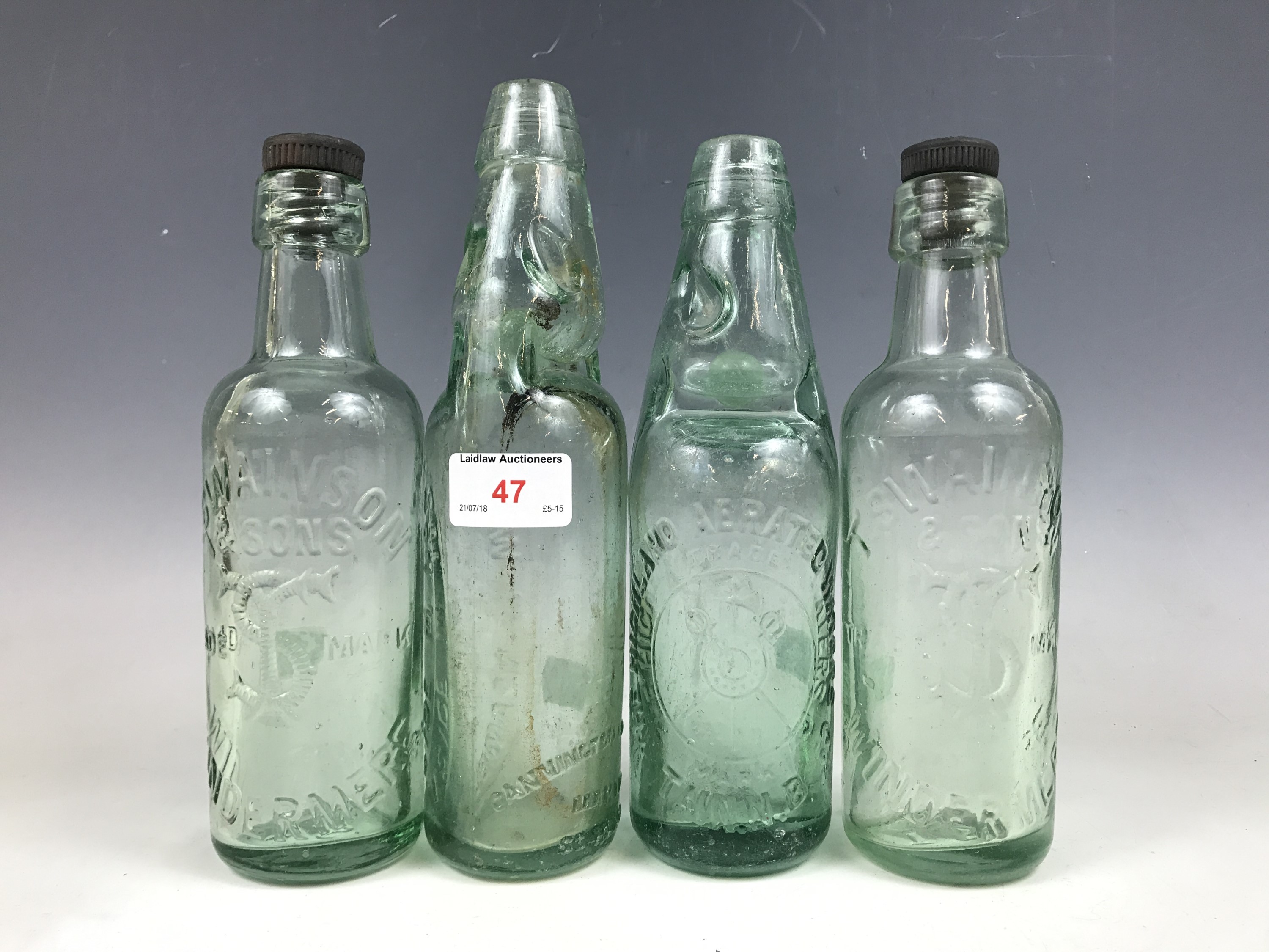 Three various Lake District Cod's patent and other bottles together with a Tain Highland Aerated