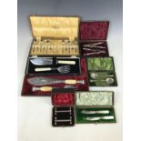 Seven boxed electroplate cutlery sets including knife rests, a pair of mother of pearl handed butter