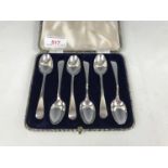 A set of six silver old English pattern coffee spoons