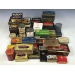 A large quantity of vintage brand /advertising tins including Rileys Toffee and OXO Cubes etc