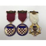 Three mid-20th Century enamelled gilt-metal Masonic jewels to the Cumberland and Westmorland