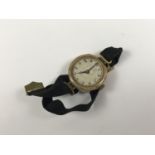 A 1920s lady's 9ct gold wristlet watch, (a/f)