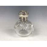 A silver mounted and cut-glass grenade-form perfume bottle