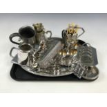 A quantity of electroplate including an egg cut cruet, toiletry jars and napkin rings etc