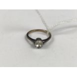 A vintage 9ct gold and paste solitaire, the stone crown set above a cathedral shank, 1.8g