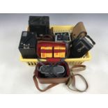 An F-Decker Compur-Rapid folding camera together with a Kodak Instamatic M2 camera, a Halina Disc