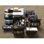 A large collection of vintage Scalextric electric model racing cars and vehicles, including a