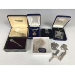 Two silver ingot pendants, one in the form of a key, together with a cased silver locket on chain, a