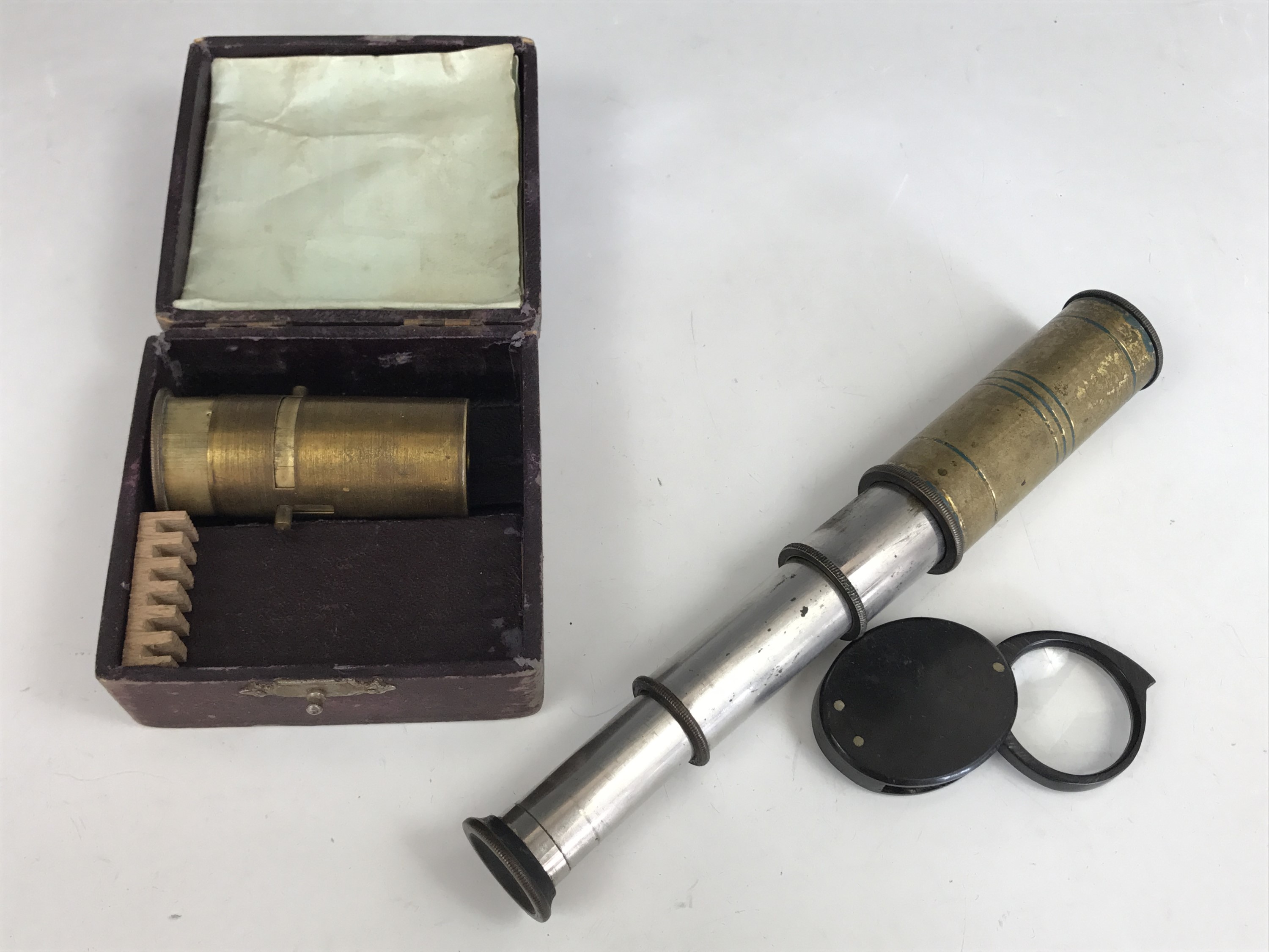 A 19th Century gentleman's boxed pocket microscope together with a three-draw pocket telescope and a