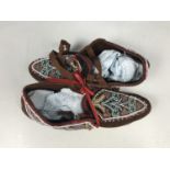 A pair of 20th Century Native American Indian beadwork shoes