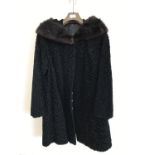 A 1950s Astrakhan fur coat