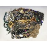 A large collection of vintage costume jewellery necklaces