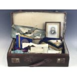 A vintage travel case containing Masonic regalia