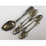 Four Georgian Thomas Wheatley of Newcastle silver teaspoons together with one Russian silver