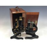 A 1920s Watts' Service microscope, cased, together with one other (a/f) microscope