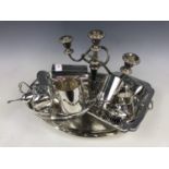 A quantity of electroplate including a candelabrum, baskets, a handled tray, tankards, a sugar