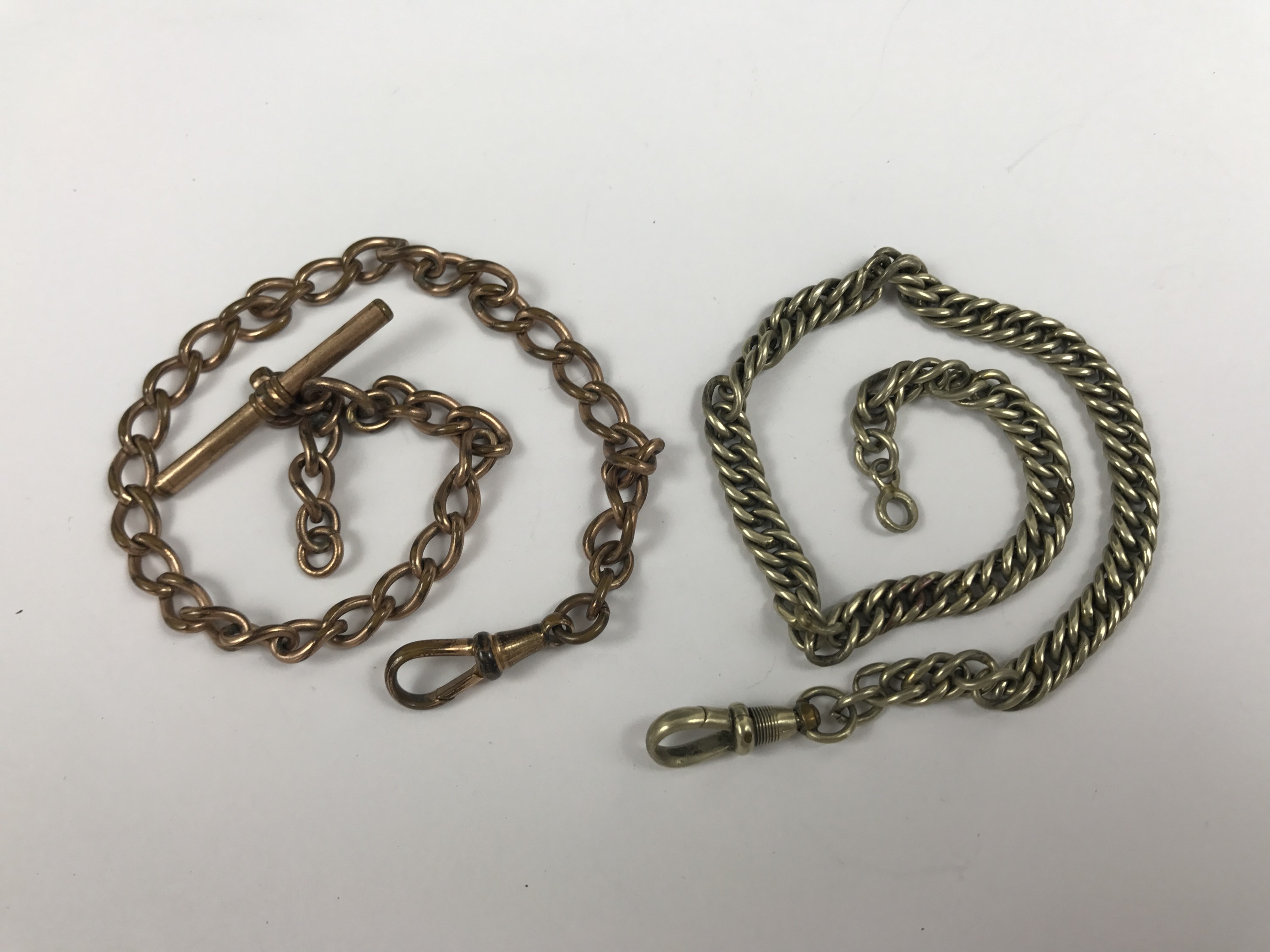 A 19th Century rolled-gold watch chain with T-bar and swivel, together with one further nickel watch