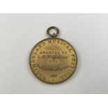 A Victorian Westmorland Music Festival "Female Voice Choir" competition prize medallion awarded to M